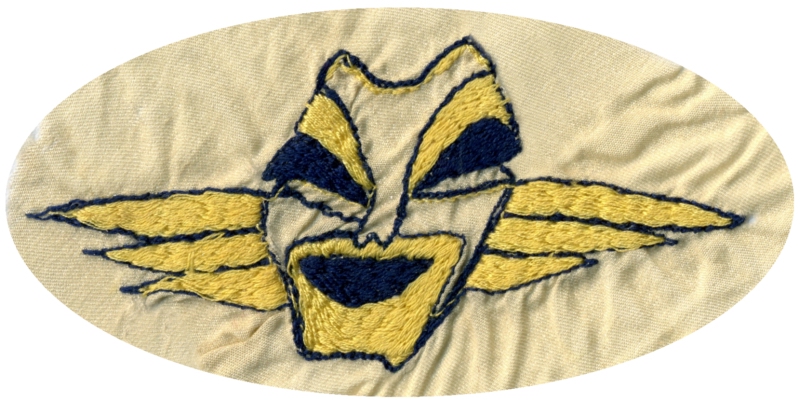 Le  masque rieur de la 6ime escadrille du GC III/6 brod par Julienne BIBERT